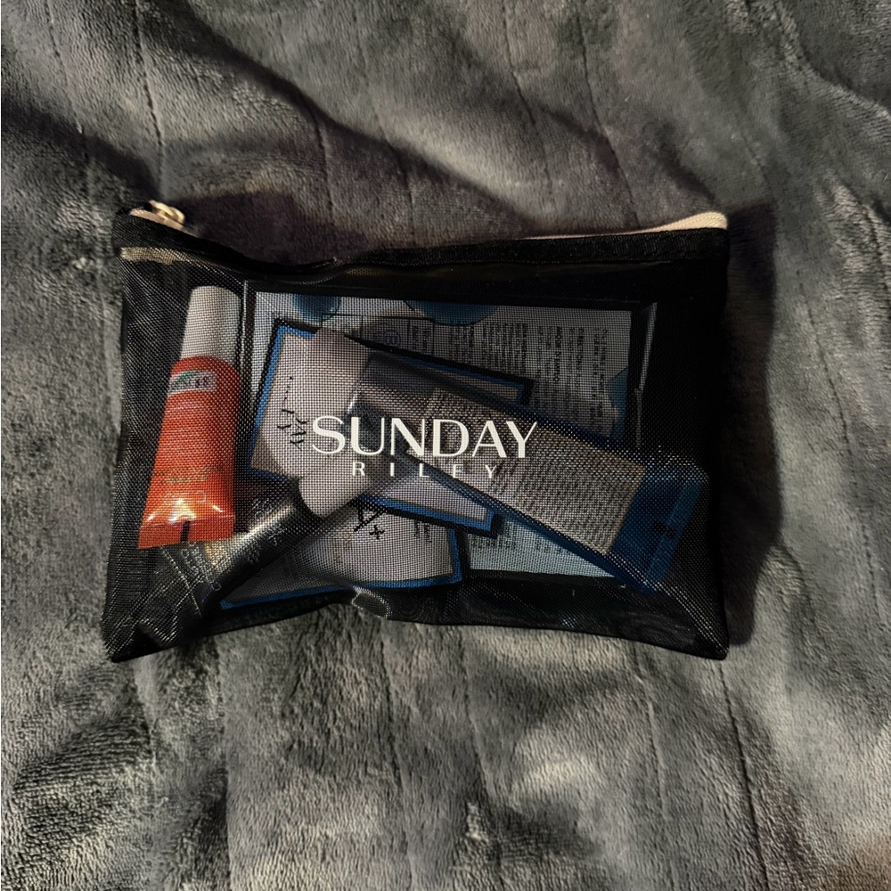 Sunday Riley Skincare Collection in Black Mesh Pouch